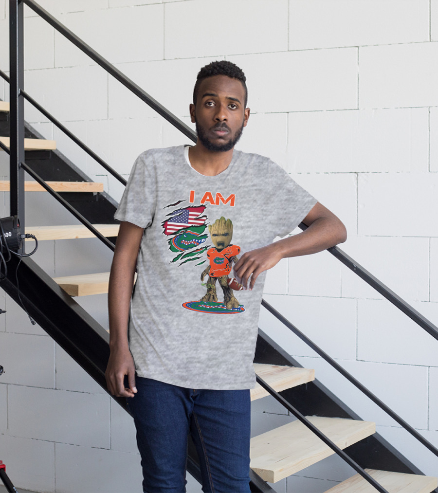 I Am Gators Baby Groot Holding Football With American Flag And Florida Gators T-Shirt