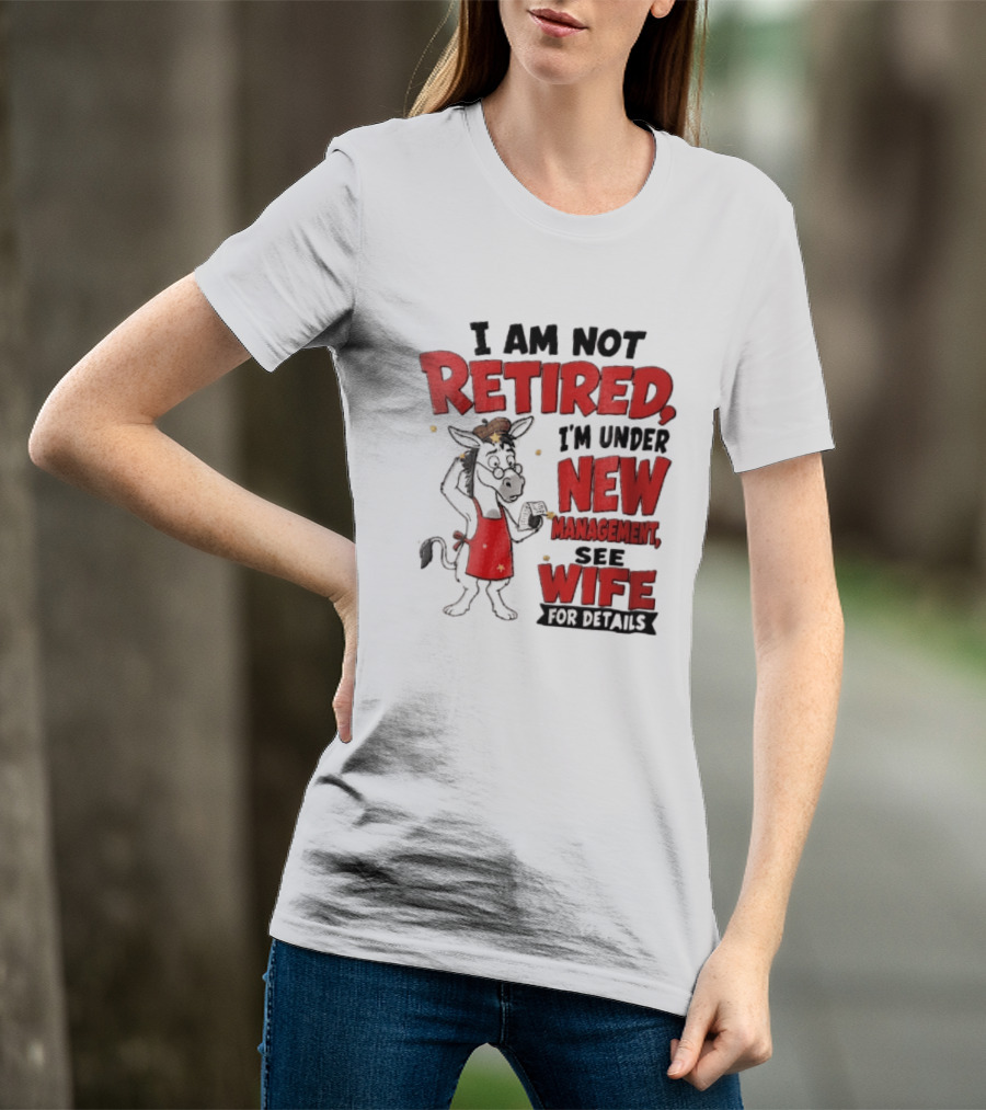 I Am Not Retired I'm Under New Management See Wife For Details Cartoon Donkey Red Apron T-Shirt