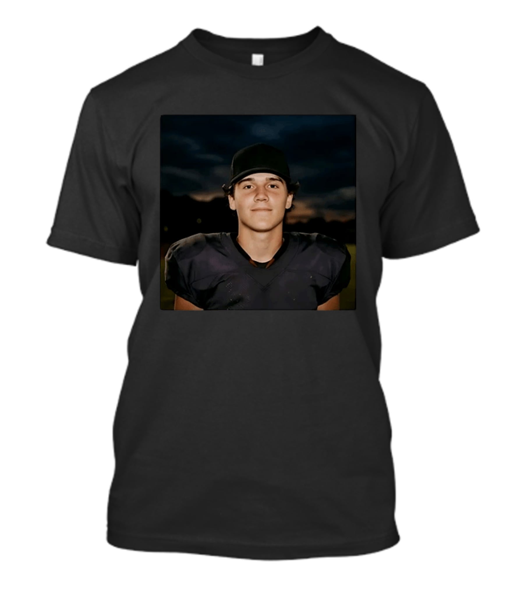 Young Football Athlete Wearing Black Cap And Shoulder Pads T-Shirt